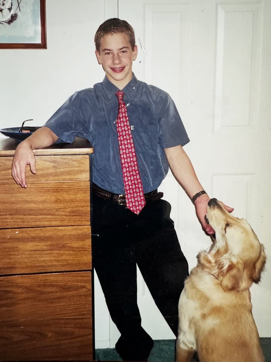 Jordan Miller as a teenager in the early 2000s, with the family dog